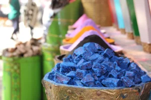 blue and white stones in brown woven basket